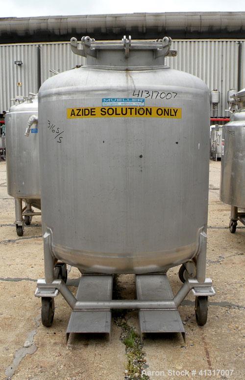 Used Mueller Tank, 275 Gallon, Model F, 316 Stainless Steel, Vertical. 46’’ diameter x 36’’ straight side, dish top and bottom. Internal rated to 15 psi. Openings: top (2) 2’’ NPT, 18’’ manway, no co...