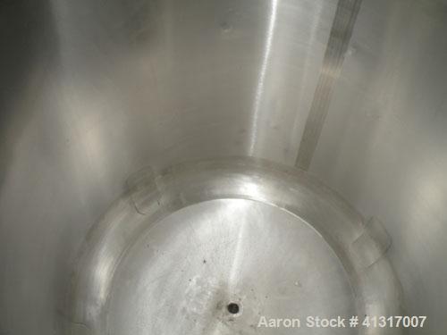Used Mueller Tank, 275 Gallon, Model F, 316 Stainless Steel, Vertical. 46’’ diameter x 36’’ straight side, dish top and bottom. Internal rated to 15 psi. Openings: top (2) 2’’ NPT, 18’’ manway, no co...