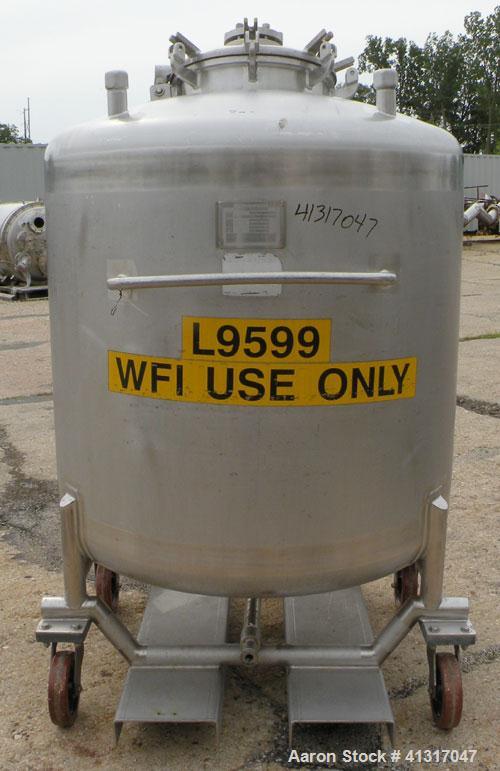 Used Mueller Pressure Tank, 275 Gallon, 316 Stainless Steel, Vertical. 46" diameter x 54" straight side. Dish top and bottom. Internal rated 15 psi and FV at 100 deg F. Openings: top (2) 1-1/2" NPT, ...