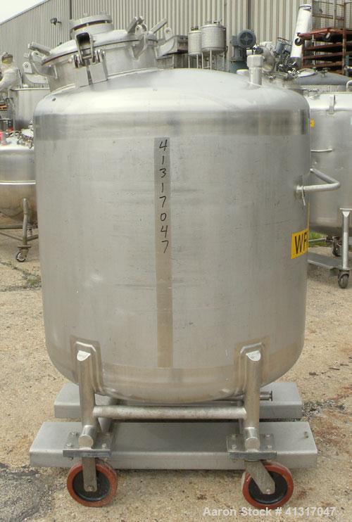 Used Mueller Pressure Tank, 275 Gallon, 316 Stainless Steel, Vertical. 46" diameter x 54" straight side. Dish top and bottom. Internal rated 15 psi and FV at 100 deg F. Openings: top (2) 1-1/2" NPT, ...