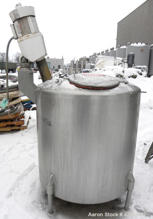 Used Perma-San Tank, 300 Gallon, Model CVC, 304 Stainless Steel, Vertical. 46" diameter x 41" straight side, dish top, slight dished bottom. Off center top entering Lightning agitator, model ND-4A. 1...