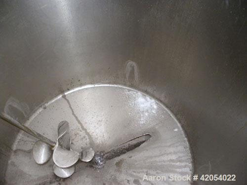 Used Perma-San Tank, 300 Gallon, Model CVC, 304 Stainless Steel, Vertical. 46" diameter x 41" straight side, dish top, slight dished bottom. Off center top entering Lightning agitator, model ND-4A. 1...