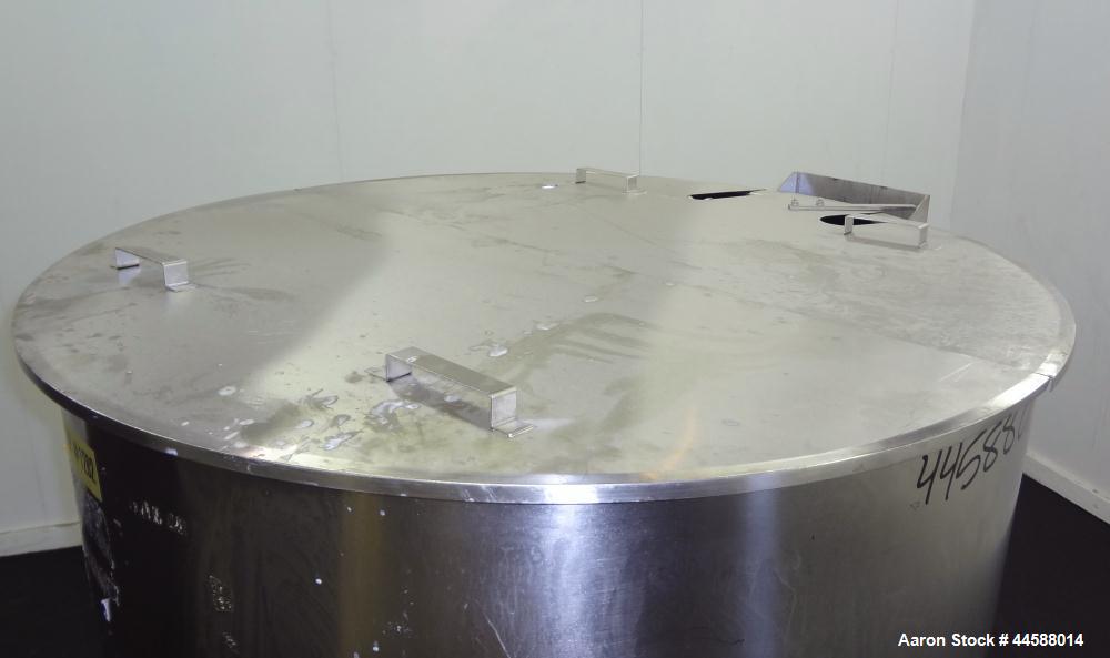 Used Perma-San Tank, 310 Gallons, Model OVS, 316 Stainless Steel, Vertical. Approximately 44” diameter x 46” straight side, open top with 1/2 covers, sloped bottom.  Provision for a clamp-on agitator...