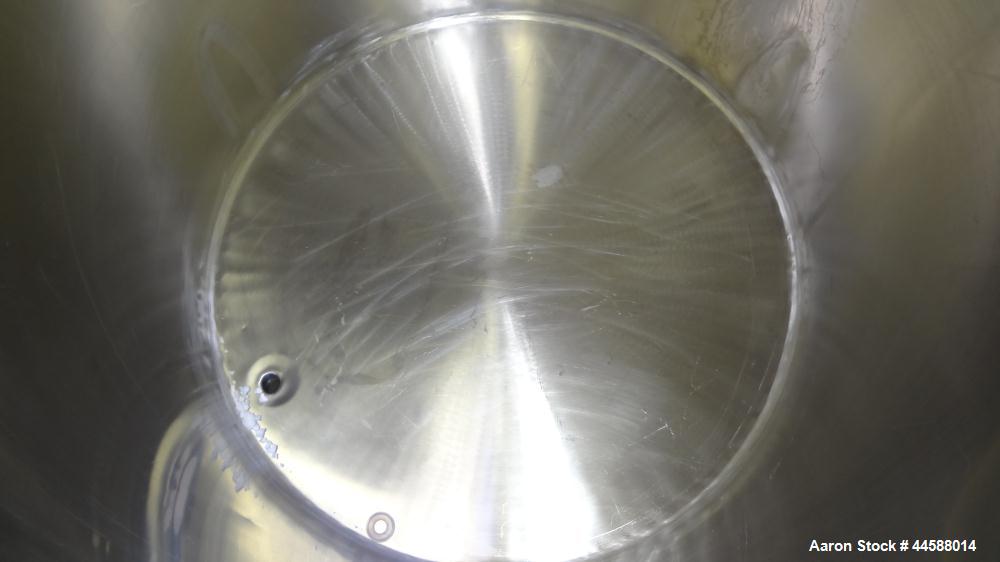 Used Perma-San Tank, 310 Gallons, Model OVS, 316 Stainless Steel, Vertical. Approximately 44” diameter x 46” straight side, open top with 1/2 covers, sloped bottom.  Provision for a clamp-on agitator...