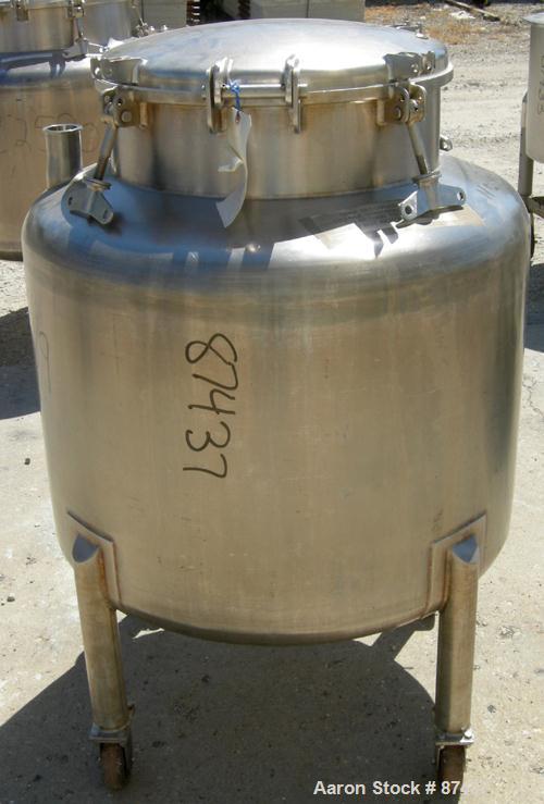 USED: Perma San tank, 80 gallon, 316 stainless steel, vertical. 32" diameter x 22" straight side, dish top and bottom. Openings: top (2) 2" tri clamp, 20" manway with cover; 2" tri clamp center botto...