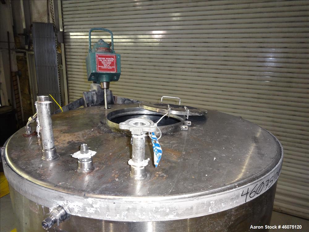 Used Perry Products Tank, Approximate 300 Gallon, 304 Stainless Steel, Vertical. Approximate 44" diameter x 50" straight side, flat top, coned bottom. Off center top entering air operated Lightnin ag...