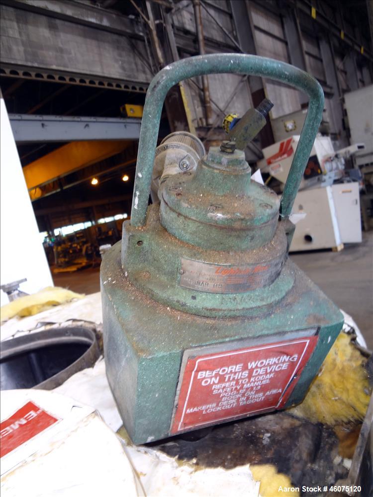 Used Perry Products Tank, Approximate 300 Gallon, 304 Stainless Steel, Vertical. Approximate 44" diameter x 50" straight side, flat top, coned bottom. Off center top entering air operated Lightnin ag...