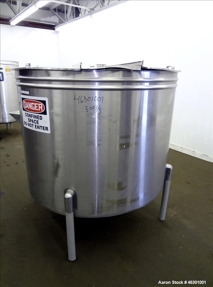 Used Tank, Approximately 450 Gallons, 304 Stainless Steel, Vertical. Approximately 57" diameter x 42" straight side, flat open top with (2) piece cover, sloped bottom. Provision for a side entering a...