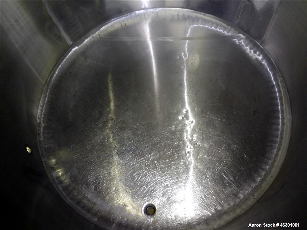 Used Tank, Approximately 450 Gallons, 304 Stainless Steel, Vertical. Approximately 57" diameter x 42" straight side, flat open top with (2) piece cover, sloped bottom. Provision for a side entering a...