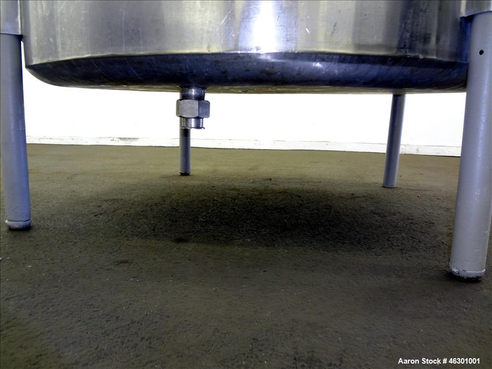 Used Tank, Approximately 450 Gallons, 304 Stainless Steel, Vertical. Approximately 57" diameter x 42" straight side, flat open top with (2) piece cover, sloped bottom. Provision for a side entering a...