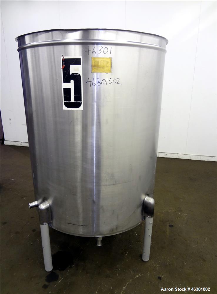Used San-I-Tank, Approximately 320 Gallons, 304 Stainless Steel, Vertical. Approximately 43" diameter x 52" straight side, flat top open top, no cover, slopped bottom. Openings: side 1.5"; 1.5" off c...