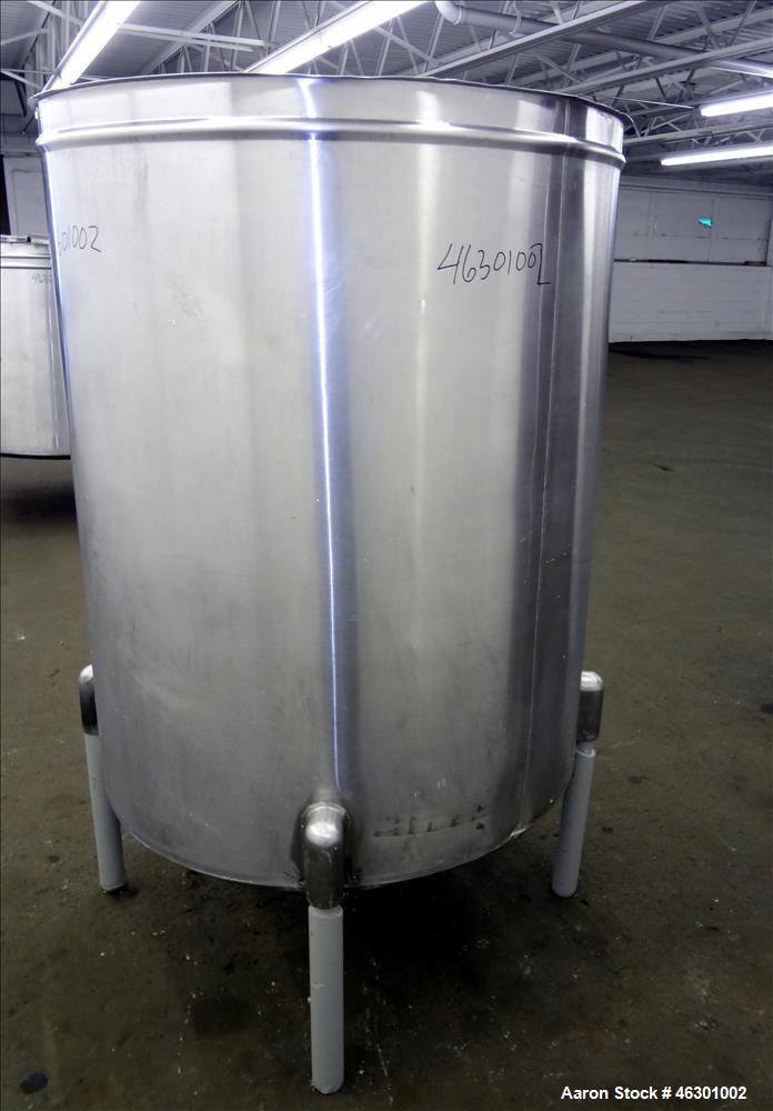Used San-I-Tank, Approximately 320 Gallons, 304 Stainless Steel, Vertical. Approximately 43" diameter x 52" straight side, flat top open top, no cover, slopped bottom. Openings: side 1.5"; 1.5" off c...