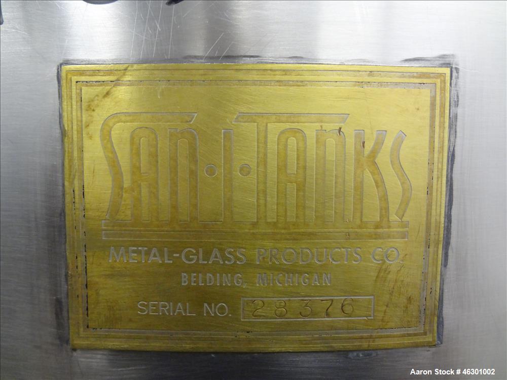 Used San-I-Tank, Approximately 320 Gallons, 304 Stainless Steel, Vertical. Approximately 43" diameter x 52" straight side, flat top open top, no cover, slopped bottom. Openings: side 1.5"; 1.5" off c...
