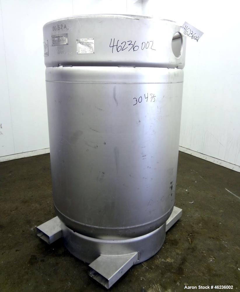 Used Sharpsville Container Pressure Tank, 1250 Liter (330 Gallon) Capacity, 304 Stainless Steel, Vertical. Approximately 44-7/8" diameter x 41" straight side. Dished top and bottom heads. Internal ra...