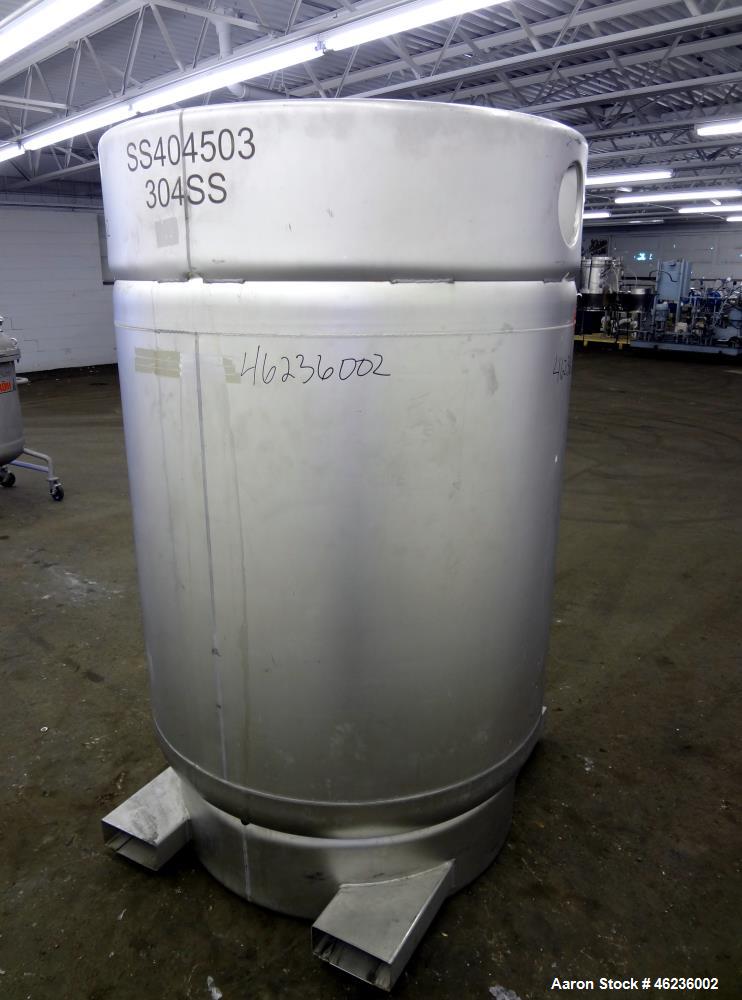 Used Sharpsville Container Pressure Tank, 1250 Liter (330 Gallon) Capacity, 304 Stainless Steel, Vertical. Approximately 44-7/8" diameter x 41" straight side. Dished top and bottom heads. Internal ra...