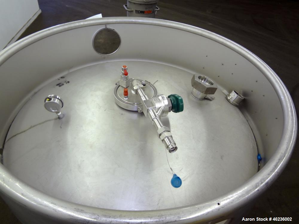 Used Sharpsville Container Pressure Tank, 1250 Liter (330 Gallon) Capacity, 304 Stainless Steel, Vertical. Approximately 44-7/8" diameter x 41" straight side. Dished top and bottom heads. Internal ra...