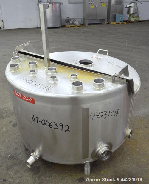Used Stainless Concepts Balance Tank, 200 Gallon, 316 Stainless Steel, Vertical. Approximate 50" diameter x 23" straight side. 2/3 Hinged top cover, sloped bottom. Openings top (3) 2", (6) 3", 6". Si...