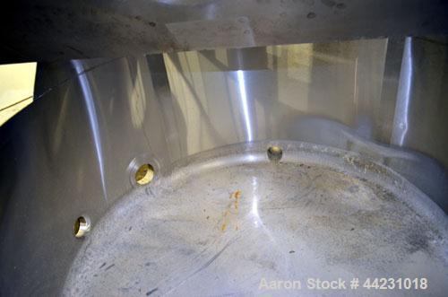 Used Stainless Concepts Balance Tank, 200 Gallon, 316 Stainless Steel, Vertical. Approximate 50" diameter x 23" straight side. 2/3 Hinged top cover, sloped bottom. Openings top (3) 2", (6) 3", 6". Si...