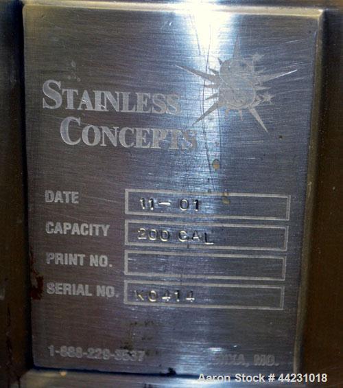 Used Stainless Concepts Balance Tank, 200 Gallon, 316 Stainless Steel, Vertical. Approximate 50" diameter x 23" straight side. 2/3 Hinged top cover, sloped bottom. Openings top (3) 2", (6) 3", 6". Si...