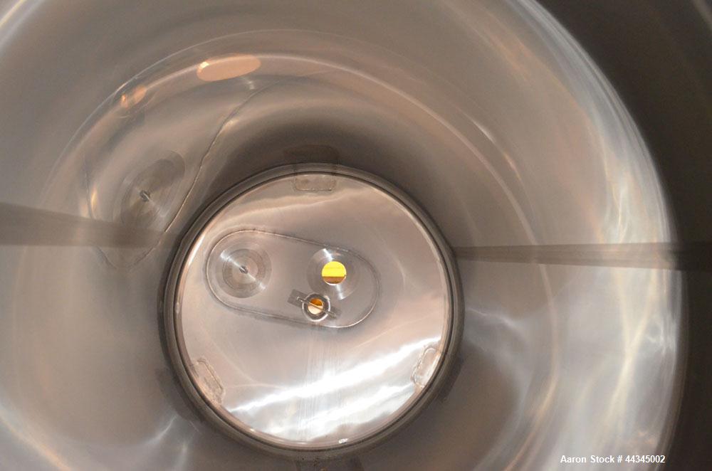 Used Stainless Fabrication Pressure Tank, 440 Gallon, 316 Stainless Steel, Vertical. 42" Diameter x 72" straight side, dished top and bottom. Insulated with 304 stainless steel sheathing. Internal ra...