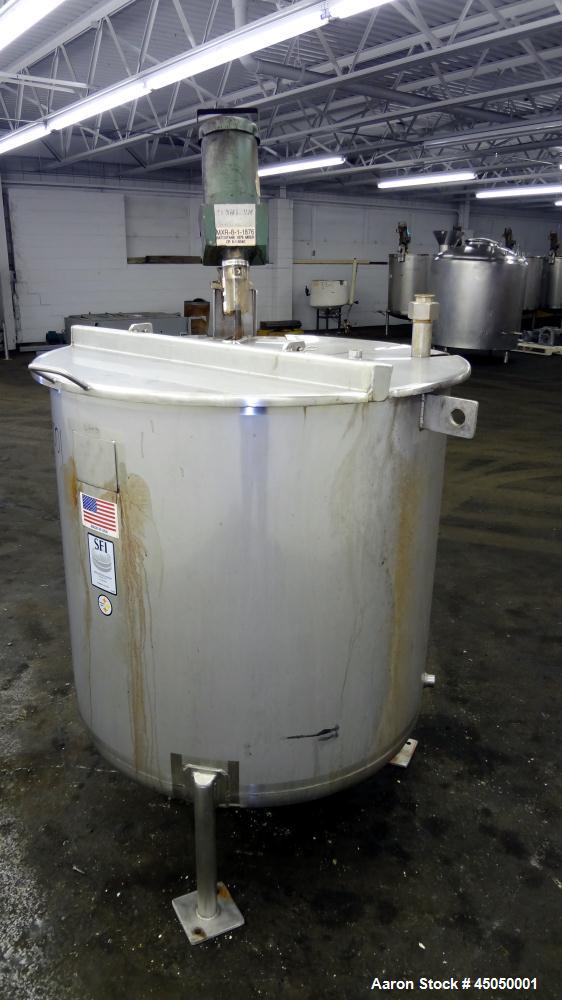 Used Stainless Fabrication Tank, 150 Gallon, 304 Stainless Steel, Vertical. Approximate 38" Diameter x 35" straight side, open top with a 1 piece 1/2 hinged cover, dished bottom. Internal rated atmos...