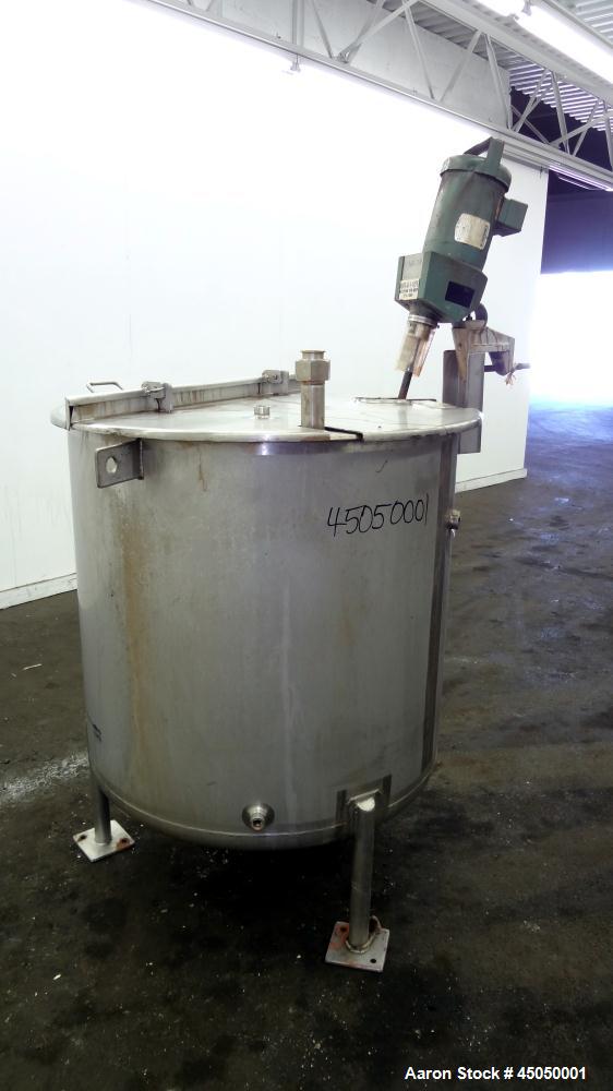 Used Stainless Fabrication Tank, 150 Gallon, 304 Stainless Steel, Vertical. Approximate 38" Diameter x 35" straight side, open top with a 1 piece 1/2 hinged cover, dished bottom. Internal rated atmos...