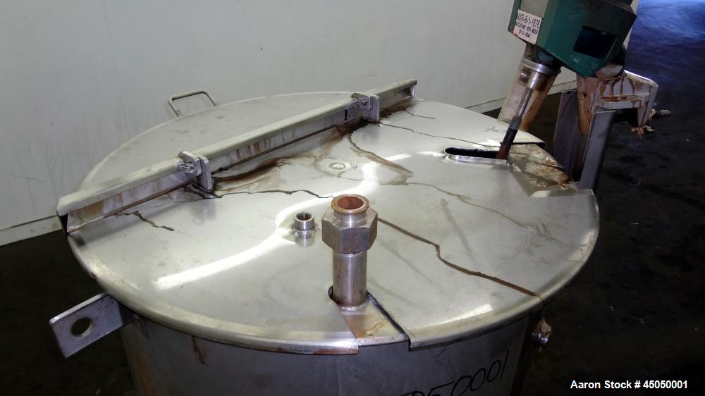 Used Stainless Fabrication Tank, 150 Gallon, 304 Stainless Steel, Vertical. Approximate 38" Diameter x 35" straight side, open top with a 1 piece 1/2 hinged cover, dished bottom. Internal rated atmos...