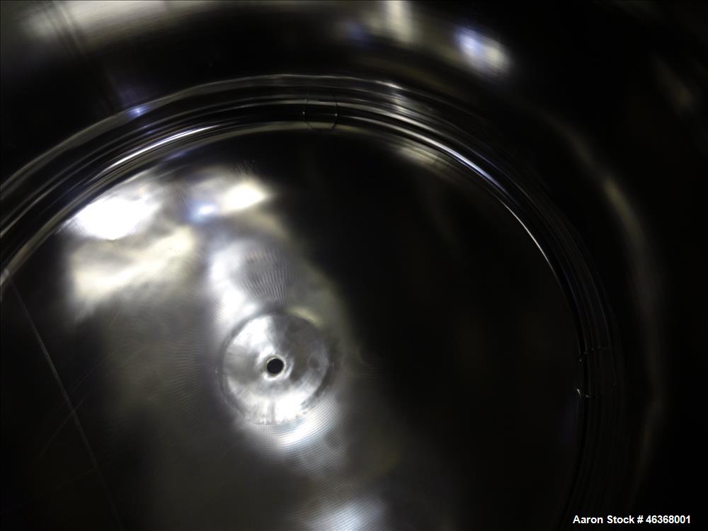 Used Stainless Fabrication Pressure Tank, 275 Gallons, 316L Stainless Steel, Vertical. 54" Diameter x 23-1/2" straight side, dished top and bottom. Internal rated 50 psi at -20 to 350 degrees F. Open...