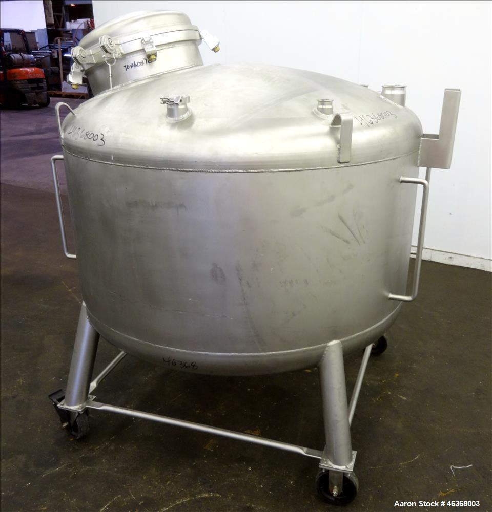 Used Stainless Fabrication Pressure Tank, 275 Gallon, 316L Stainless Steel, Vertical. 54" Diameter x 23-1/2" straight side, dished top and bottom. Internal rated 50 psi at -20 to 350 degrees F. Openi...