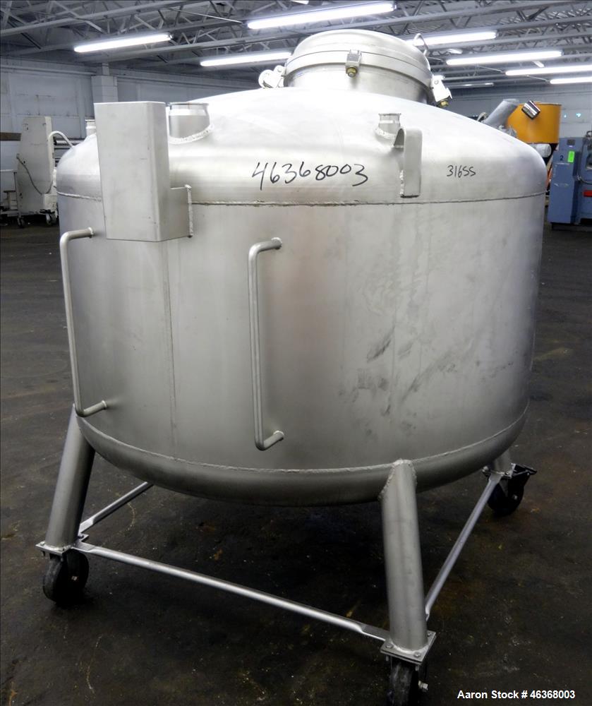 Used Stainless Fabrication Pressure Tank, 275 Gallon, 316L Stainless Steel, Vertical. 54" Diameter x 23-1/2" straight side, dished top and bottom. Internal rated 50 psi at -20 to 350 degrees F. Openi...