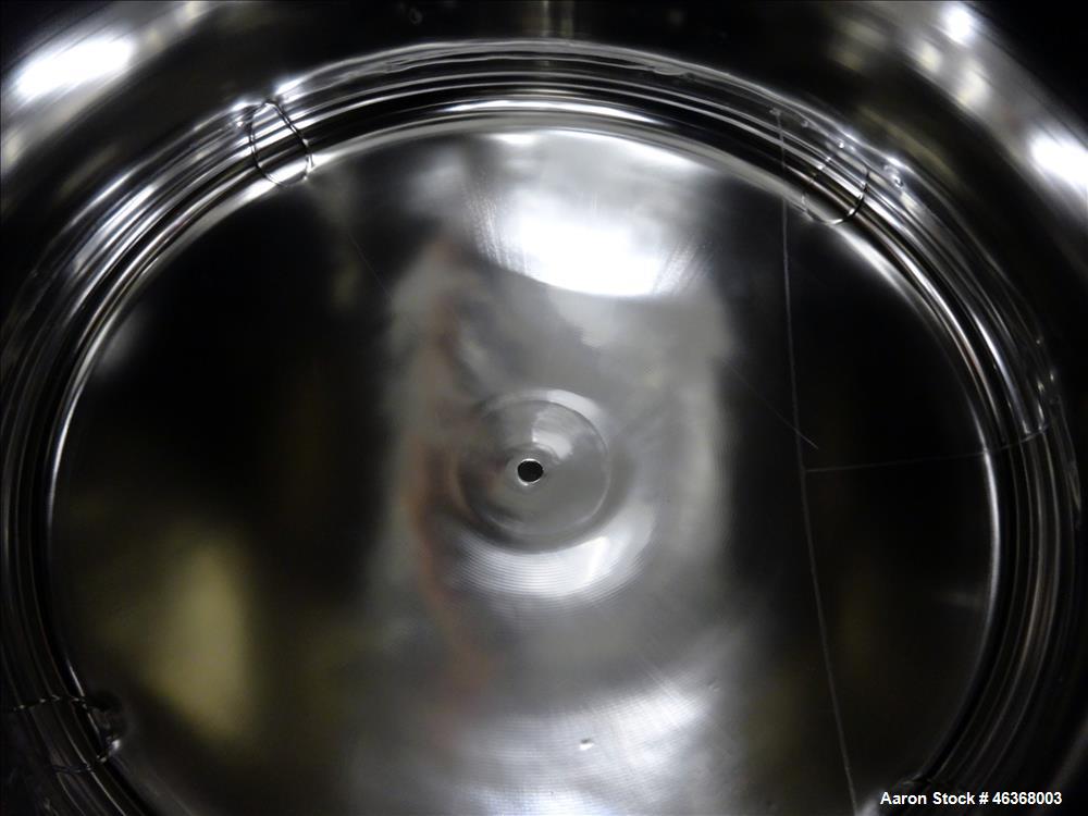 Used Stainless Fabrication Pressure Tank, 275 Gallon, 316L Stainless Steel, Vertical. 54" Diameter x 23-1/2" straight side, dished top and bottom. Internal rated 50 psi at -20 to 350 degrees F. Openi...