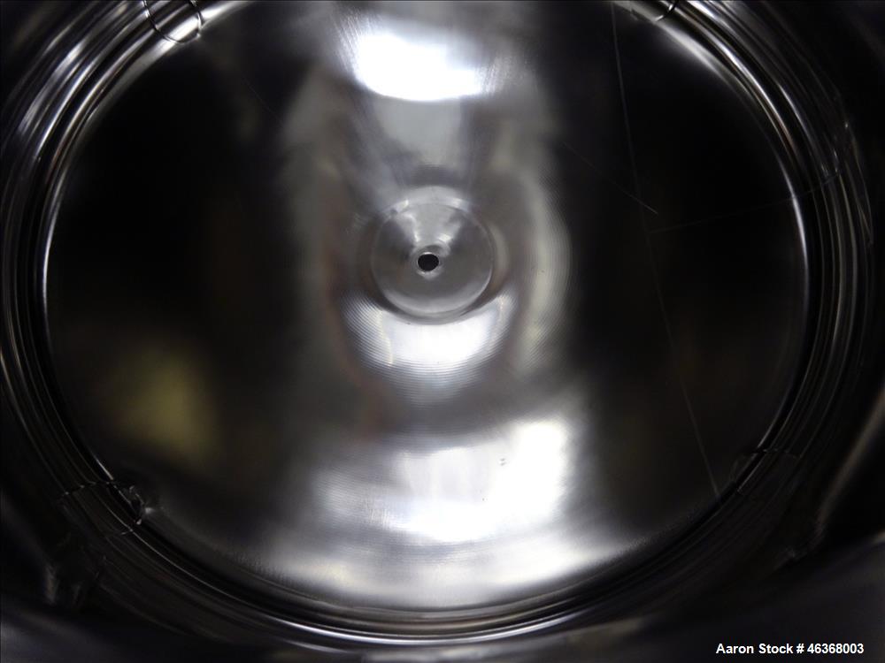 Used Stainless Fabrication Pressure Tank, 275 Gallon, 316L Stainless Steel, Vertical. 54" Diameter x 23-1/2" straight side, dished top and bottom. Internal rated 50 psi at -20 to 350 degrees F. Openi...
