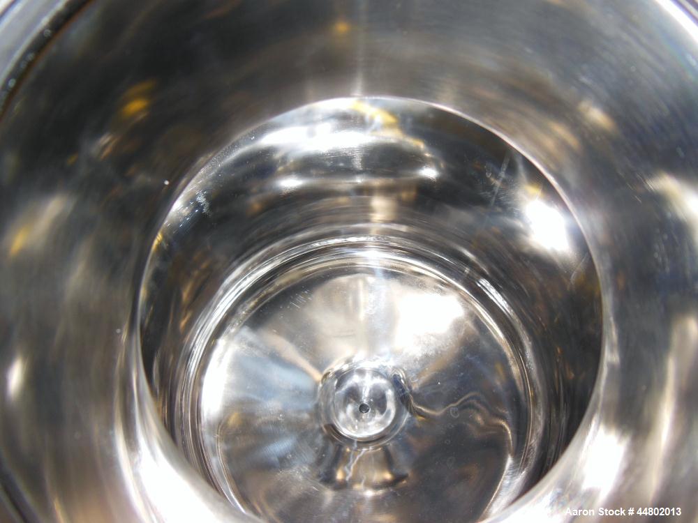 Used T&C Stainless Pressure Tank, 20 Liters (5.2 Gallons), 316L Stainless Steel, Vertical.  Approximately 12" diameter x 12" straight side, dished top and bottom. Internal rated 50 psi/ full vacuum a...