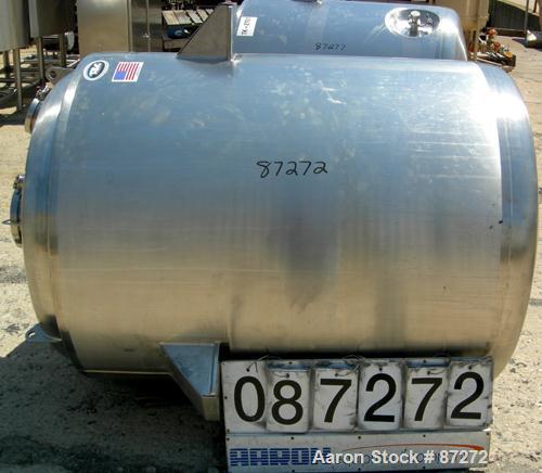 USED: T&C stainless pressure tank, 1000 liter (264 gallon), 316L stainless steel, vertical. 40" diameter x 48" straight side. Dished top and bottom. Internal rated 50 psi/FV at 301 deg F. 304 stainle...