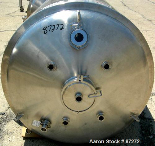 USED: T&C stainless pressure tank, 1000 liter (264 gallon), 316L stainless steel, vertical. 40" diameter x 48" straight side. Dished top and bottom. Internal rated 50 psi/FV at 301 deg F. 304 stainle...