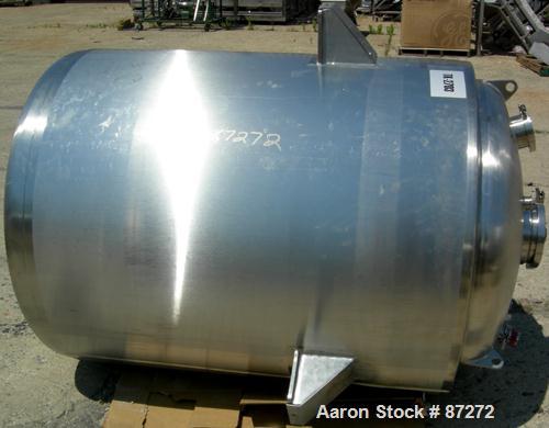 USED: T&C stainless pressure tank, 1000 liter (264 gallon), 316L stainless steel, vertical. 40" diameter x 48" straight side. Dished top and bottom. Internal rated 50 psi/FV at 301 deg F. 304 stainle...