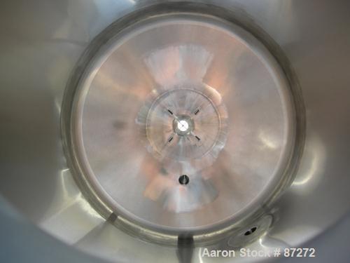 USED: T&C stainless pressure tank, 1000 liter (264 gallon), 316L stainless steel, vertical. 40" diameter x 48" straight side. Dished top and bottom. Internal rated 50 psi/FV at 301 deg F. 304 stainle...