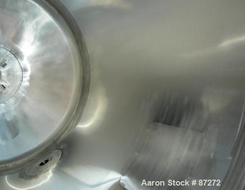 USED: T&C stainless pressure tank, 1000 liter (264 gallon), 316L stainless steel, vertical. 40" diameter x 48" straight side. Dished top and bottom. Internal rated 50 psi/FV at 301 deg F. 304 stainle...