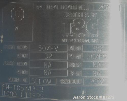 USED: T&C stainless pressure tank, 1000 liter (264 gallon), 316L stainless steel, vertical. 40" diameter x 48" straight side. Dished top and bottom. Internal rated 50 psi/FV at 301 deg F. 304 stainle...