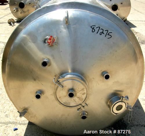 USED: T&C stainless pressure tank, 1000 liter (264 gallon), 316L stainless steel, vertical. 40" diameter x 48" straight side. Dished top and bottom. Internal rated 50 psi/FV at 301 deg F. 304 stainle...