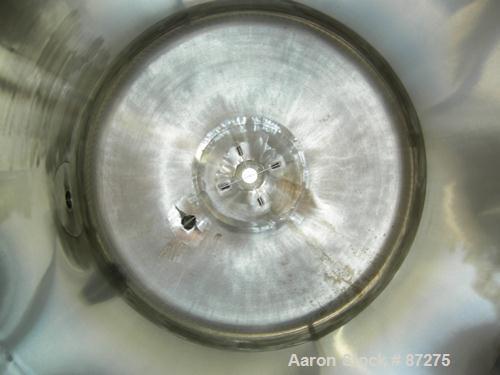 USED: T&C stainless pressure tank, 1000 liter (264 gallon), 316L stainless steel, vertical. 40" diameter x 48" straight side. Dished top and bottom. Internal rated 50 psi/FV at 301 deg F. 304 stainle...