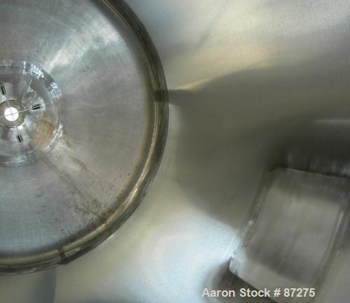 USED: T&C stainless pressure tank, 1000 liter (264 gallon), 316L stainless steel, vertical. 40" diameter x 48" straight side. Dished top and bottom. Internal rated 50 psi/FV at 301 deg F. 304 stainle...