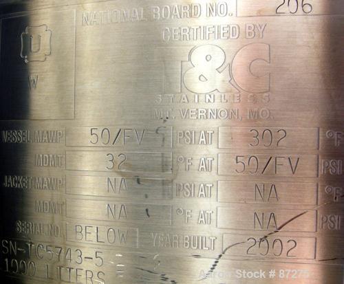 USED: T&C stainless pressure tank, 1000 liter (264 gallon), 316L stainless steel, vertical. 40" diameter x 48" straight side. Dished top and bottom. Internal rated 50 psi/FV at 301 deg F. 304 stainle...