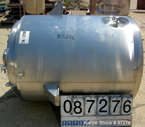USED: T&C stainless pressure tank, 1000 liter (264 gallon), 316L stainless steel, vertical. 40" diameter x 48" straight side. Dished top and bottom. Internal rated 50 psi/FV at 301 deg F. 304 stainle...