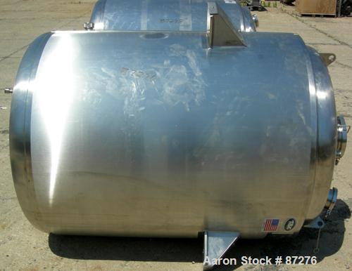 USED: T&C stainless pressure tank, 1000 liter (264 gallon), 316L stainless steel, vertical. 40" diameter x 48" straight side. Dished top and bottom. Internal rated 50 psi/FV at 301 deg F. 304 stainle...