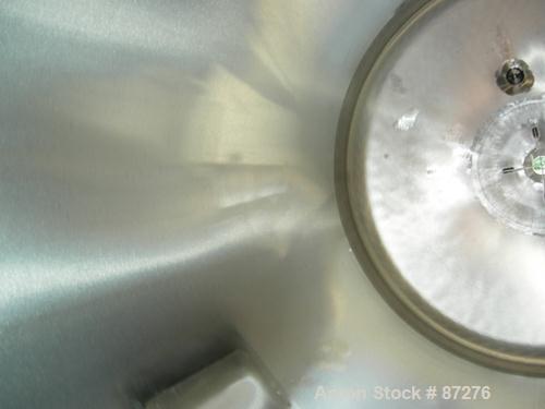 USED: T&C stainless pressure tank, 1000 liter (264 gallon), 316L stainless steel, vertical. 40" diameter x 48" straight side. Dished top and bottom. Internal rated 50 psi/FV at 301 deg F. 304 stainle...