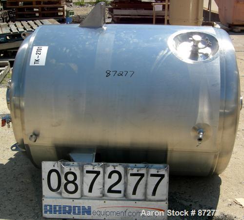 USED: T&C stainless pressure tank, 1000 liter (264 gallon), 316L stainless steel, vertical. 40" diameter x 48" straight side. Dished top and bottom. Internal rated 50 psi/FV at 301 deg F. 304 stainle...
