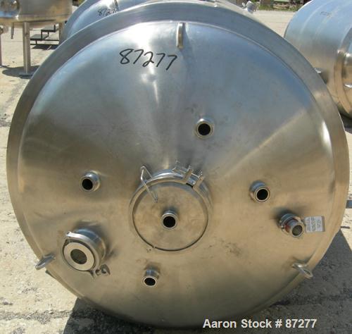 USED: T&C stainless pressure tank, 1000 liter (264 gallon), 316L stainless steel, vertical. 40" diameter x 48" straight side. Dished top and bottom. Internal rated 50 psi/FV at 301 deg F. 304 stainle...