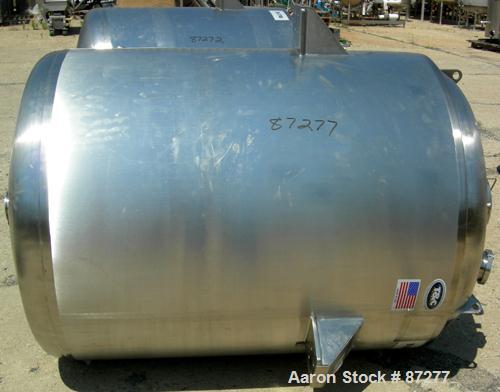 USED: T&C stainless pressure tank, 1000 liter (264 gallon), 316L stainless steel, vertical. 40" diameter x 48" straight side. Dished top and bottom. Internal rated 50 psi/FV at 301 deg F. 304 stainle...