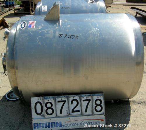 USED: T&C stainless pressure tank, 1000 liter (264 gallon), 316L stainless steel, vertical. 40" diameter x 48" straight side. Dished top and bottom. Internal rated 50 psi/FV at 301 deg F. 304 stainle...